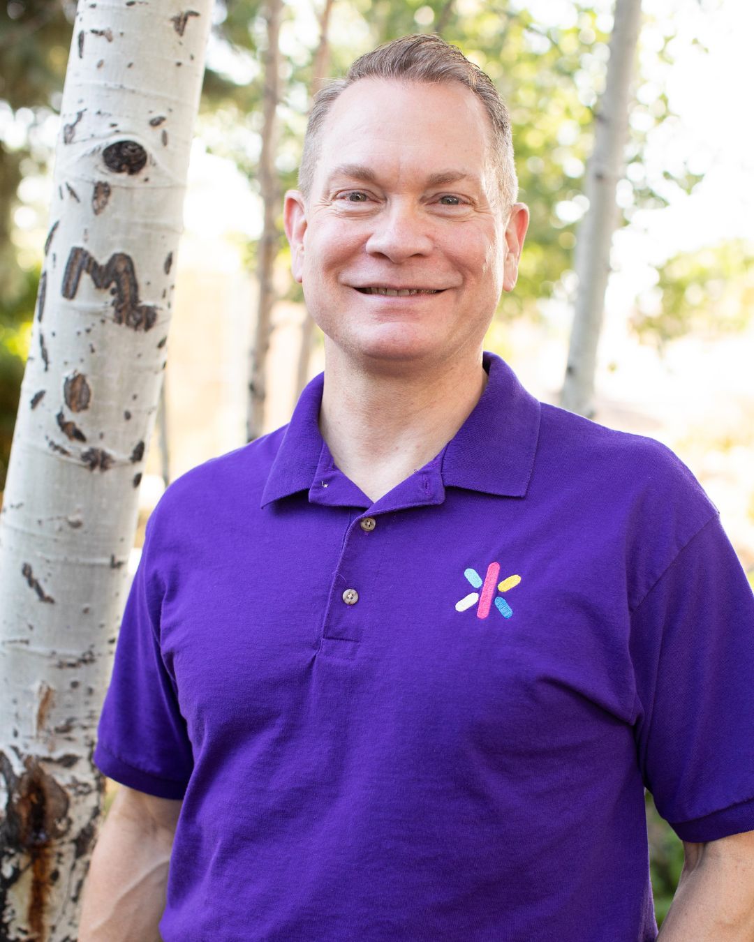 Picture of Ken Kilday Wearing Purple Leader's Cut Shirt