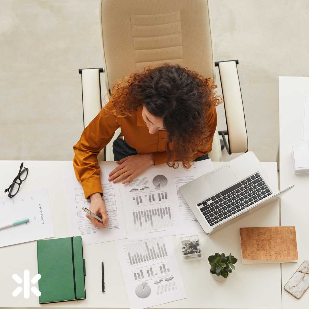 overhead shot of female at her desk