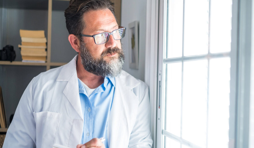 Dentist thinking about the future of his dental practice