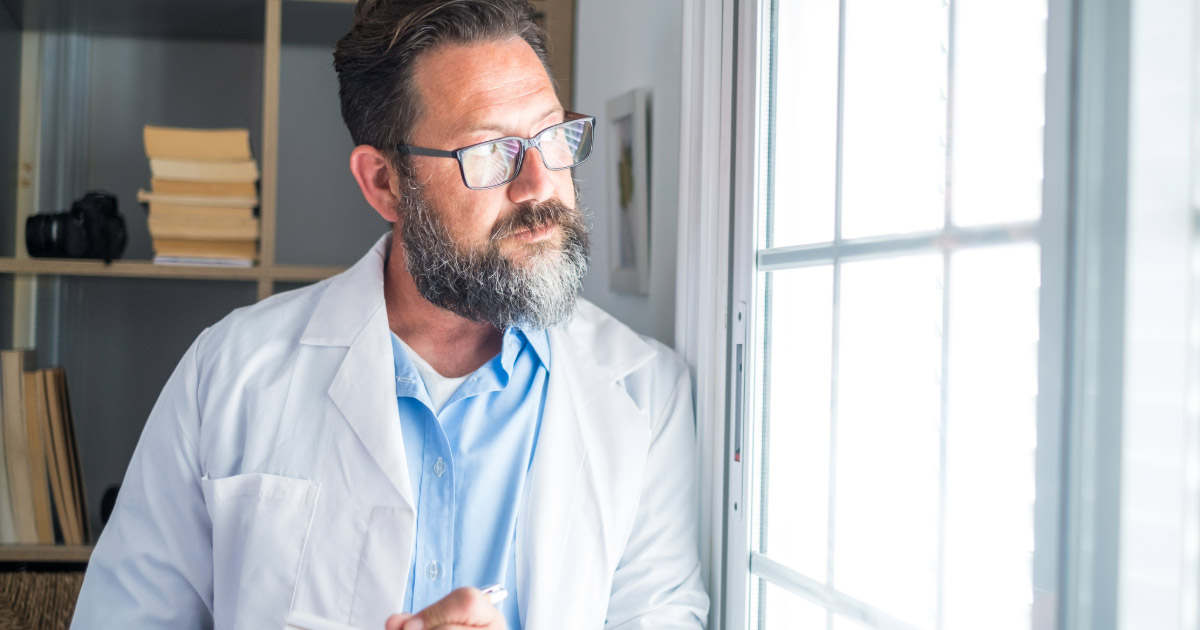 Dentist thinking about the future of his dental practice