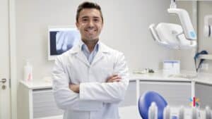 Confident dentist in a Flagstaff Arizona dental office representing leadership development and dental practice coaching for long term success