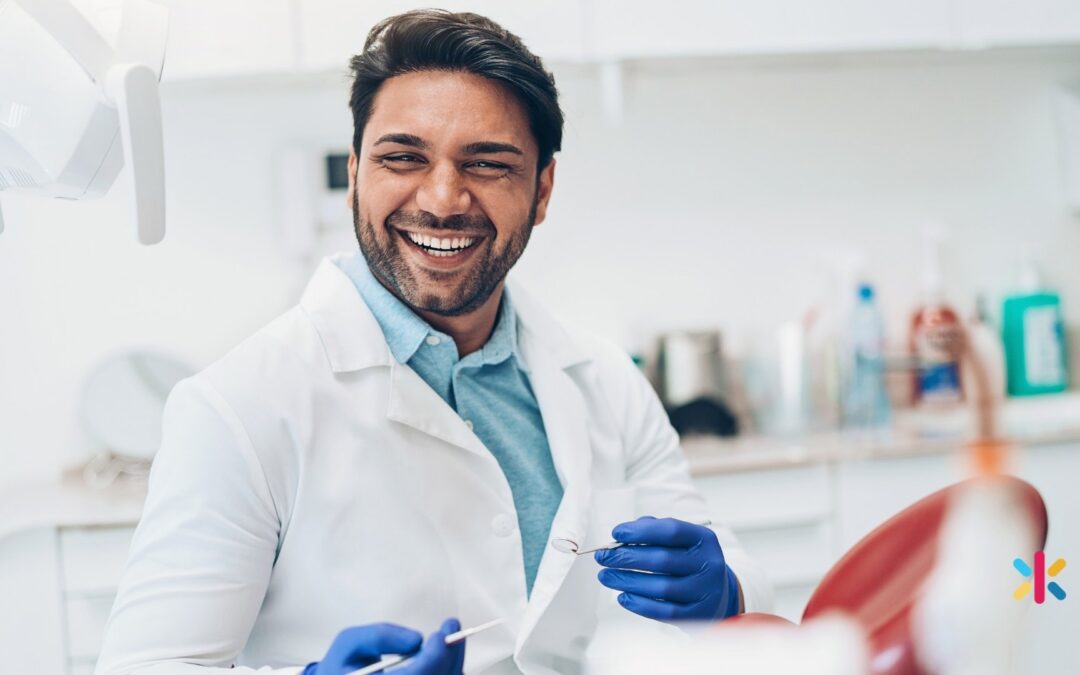 Smiling dentist in a Flagstaff Arizona dental office representing strong team culture and leadership developed through dental coaching